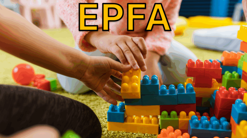 picture of two children playing with lego blocks